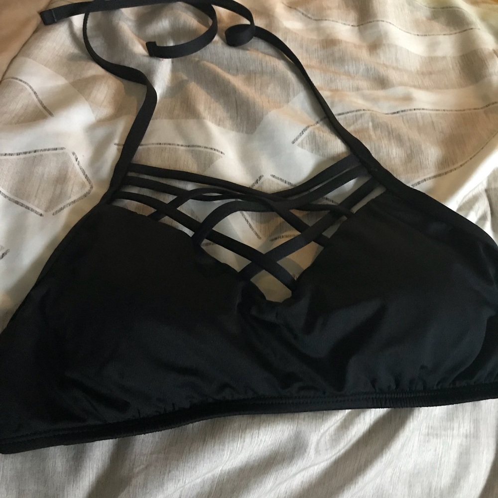 Missing black swim top new never used